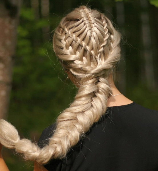 a young blone woman with waterfall bubble braids