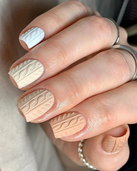 cable knit nails from white to peach color