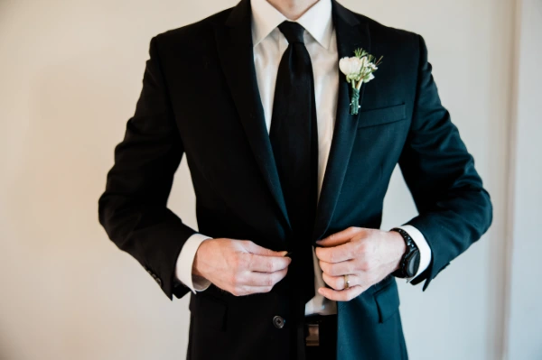 a man in a formal wedding attire