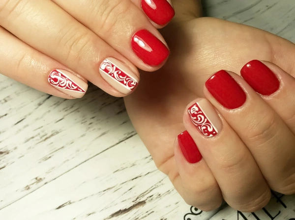 line art nails with red and white nail polish