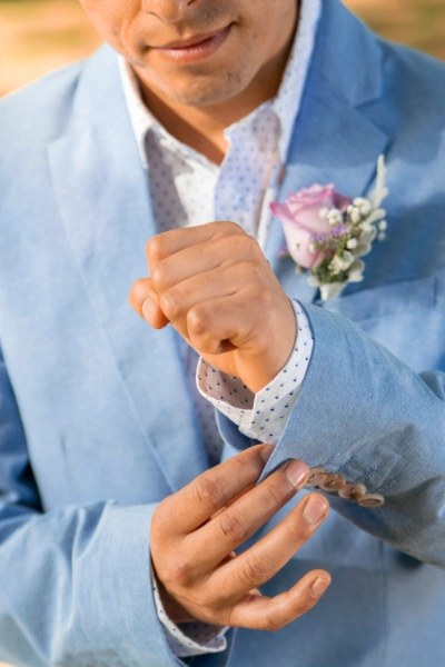 a man in a blue spring wedding attire