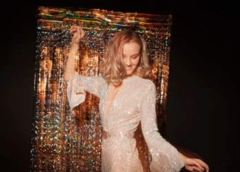 a young woman in her new years eve dress
