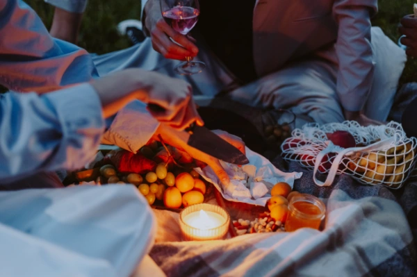 a couple has a picnic on Valentine's day