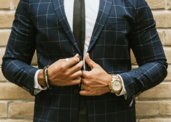 a men wearing a blue white checkered suit with mens suit accessory